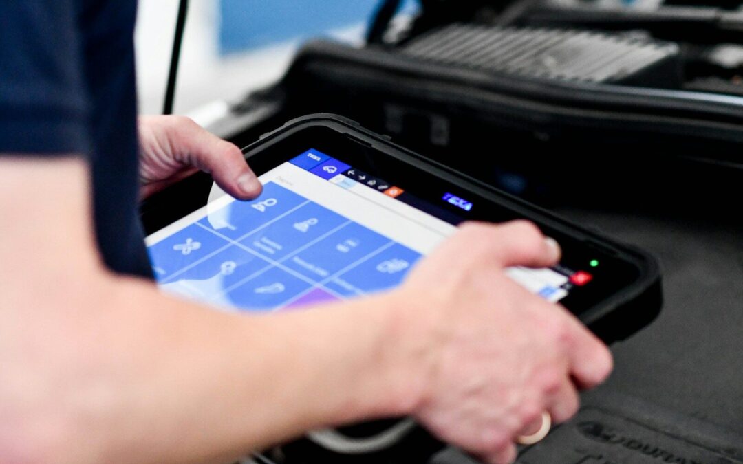 person playing game on black laptop computer